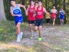 At the midway point in the race. A pack of runners with Stratford's Dyllan Asuncion drafting the leaders on October 13th at Milford's Eisenhower Park.