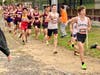 Stratford's Dyllan Asuncion working his way up the line ahead of him with an endless line now behind him within the first half mile of the 2023 SWC Championships at Bethel's Mark Goodwin 5K course on October 18th 2023