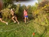 Bunnell's Abbi Forcier battles through the hill and the erosion on New Fairfield's trails in the wilderness just behind a pair of Newtown Nighthawk runners.   Forcier went on to over take the runners on Tuesday October 13th 2026