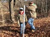 Ryan and Logan Such prepping a bird house pole