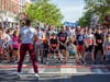 Mike Rodgers of Soul Strong Fitness gets runners and walkers warmed up for the Red Bank Classic.