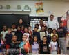 Senator Bryan Townsend poses with students from Thurgood Marshall Elementary School to recognize their 2023 National Blue Ribbon Award achievement.