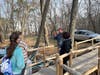 Stockton Research Assistant, Ryan Hegarty and Education Specialist, Debra Sommers explain details of “The Maple Project” to students Isabella Simpson and Avery Hilles of Southern Regional Middle School at Tween Tech held on March 17. 