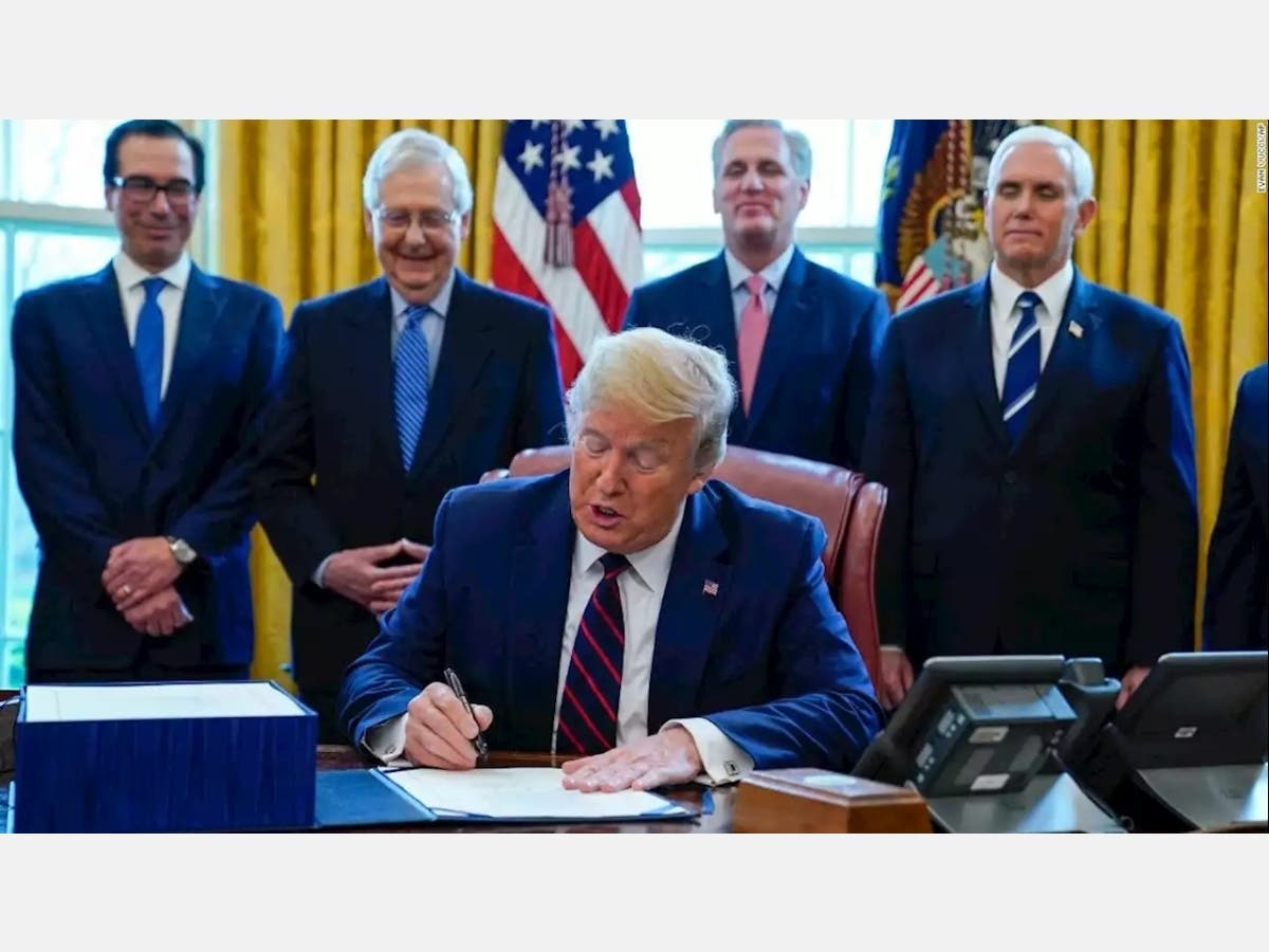 Republican President Donald Trump signed legislation supported by Rep. Bonnie Watson Coleman but her challenger -- Lisa McCormick -- called the measure "a $6 trillion slush fund."