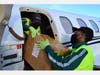 Million Air employees load masks on plane in Houston. 