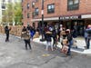 Residents of Ross F. Calcagno Homes and Palisade Towers in Yonkers receive food donations. 