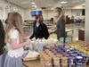 The Ursuline School Director of Philanthropy Catherine McCarthy with 8th graders