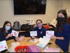 Ursuline School Sophomores Sarah Brannigan, Maeve Ryan and organizer Ally Patz.