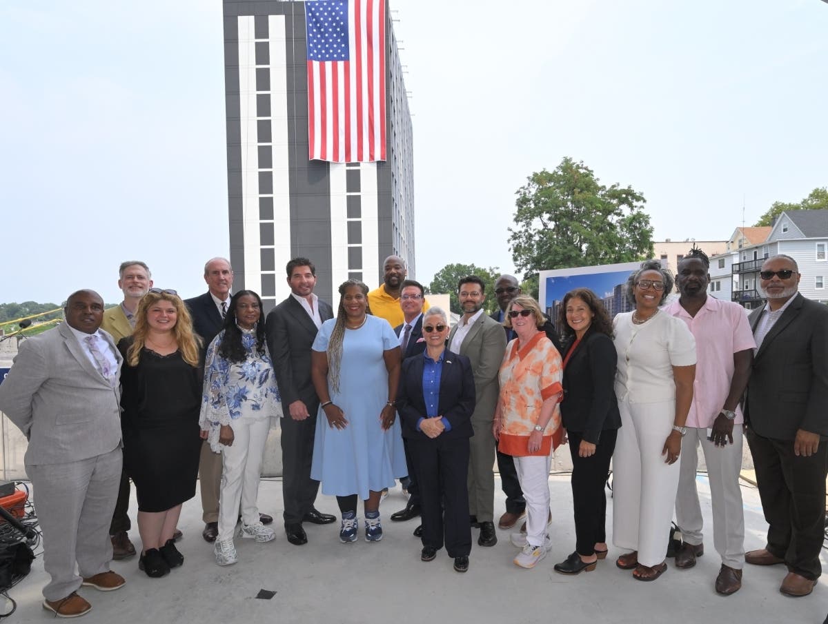 Officials at topping off ceremony on August 11