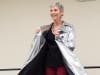 WSL member Michele Williams shines in a silver coat.