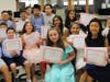 Berry Hill students proudly display their certificates after the ceremony.
