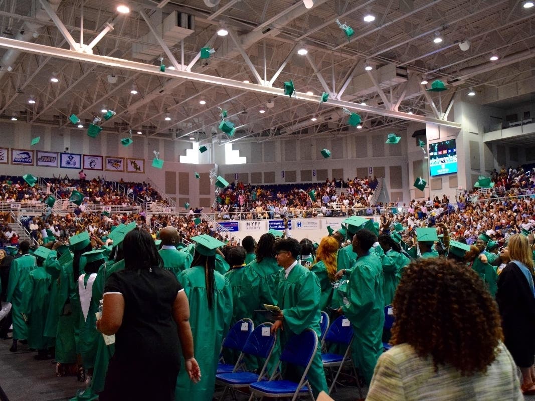 Elmont Memorial High School’s Class of 2019 tossed their caps in celebration.