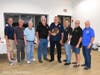 Chiefs and ex-chiefs of the East Northport Fire Department congratulate Ex-Chief Bill Faltin for 50 years.