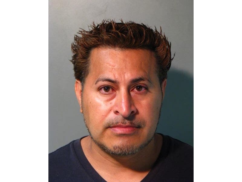 Selvin Ortiz followed two teenage girls home and gestured for them to get in his car in Westbury, police said.