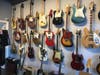 Some of the guitars available at Well Strung Guitars on Farmingdale's Main Street.