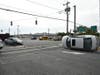 A car overturned in Hicksville following a collision Tuesday morning. Two were injured.