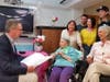 Senator Gaughran, Adele Gordon, and her friends and family. 