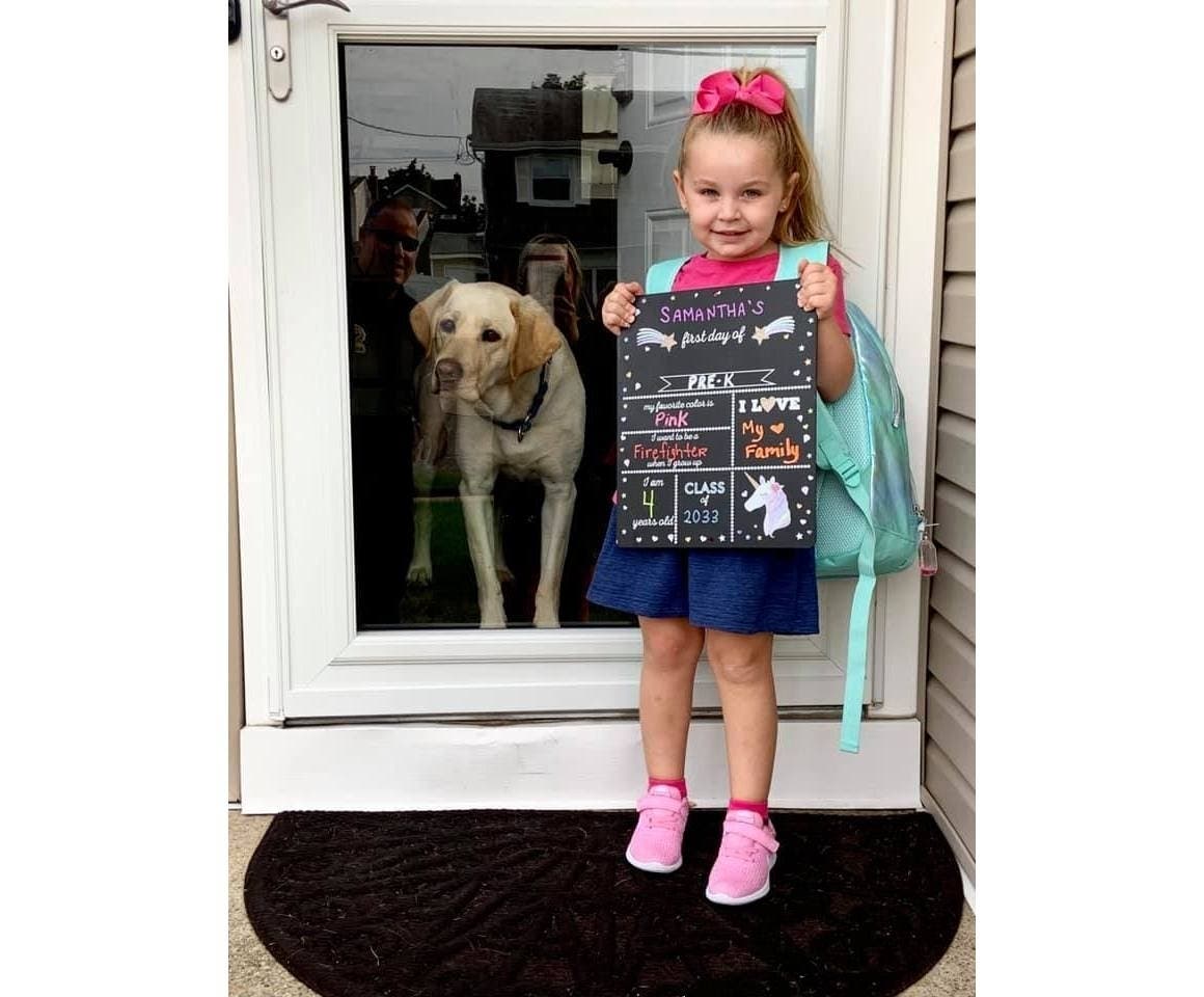 First day of Pre-k! This little girl's pup was there to send her off. She's just one student who returned to school in Farmingdale.