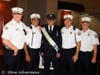 Grand Marshal Don Natiello, center, is congratulated by Greenlawn Fire Chiefs. (from left) Joe Pace, Angelo Santomauro, Joe Costanza and Pete Miller.  