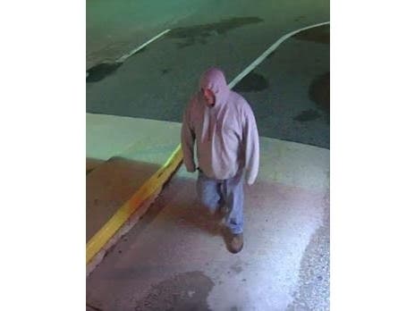 The man robbed a woman who was making a bank drop deposit at a Bank of America in Lake Grove: police. 