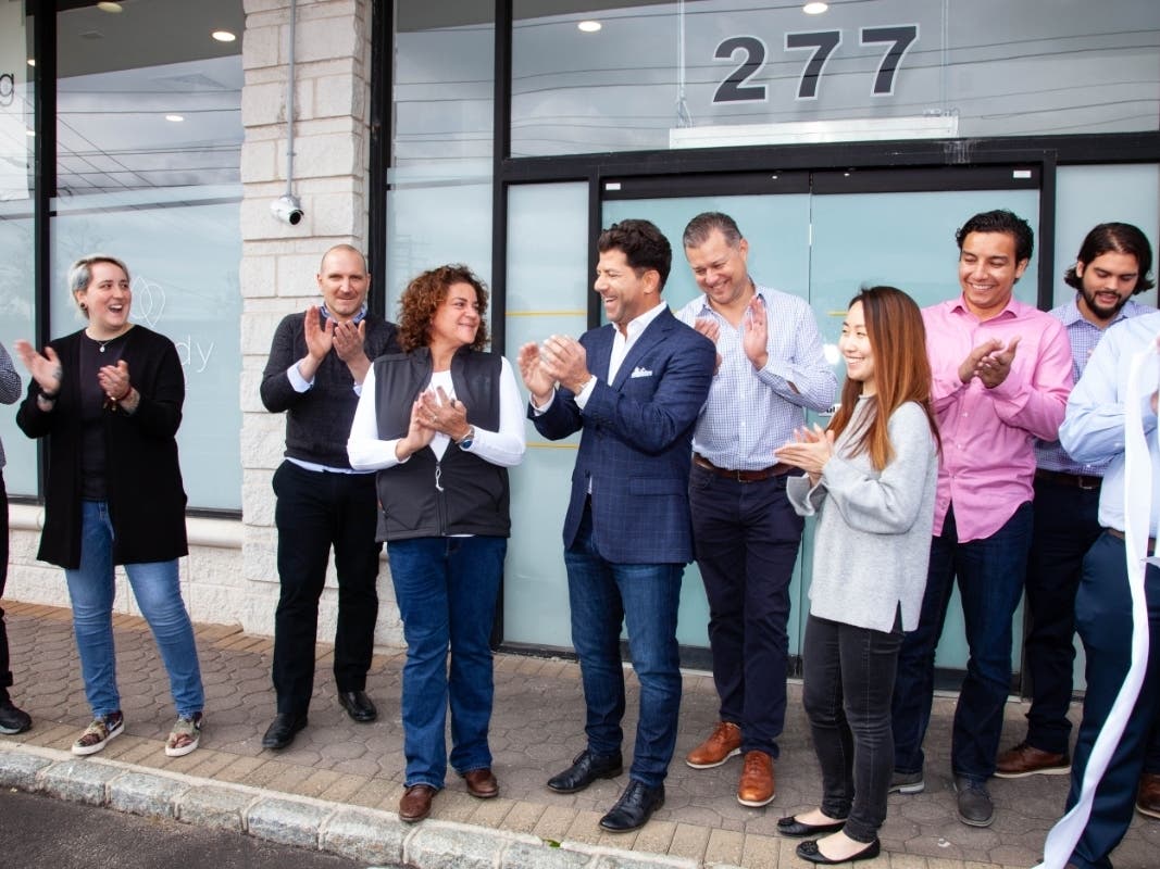 L-R: Jason Berkenstock, Liz Cramer Ernst, Jason Erkes, Jourdan Kurtz, Teresa Lee, Nick Lemoine. Remedy, a NY medical cannabis dispensary, officially opened in Huntington Station on Wednesday.