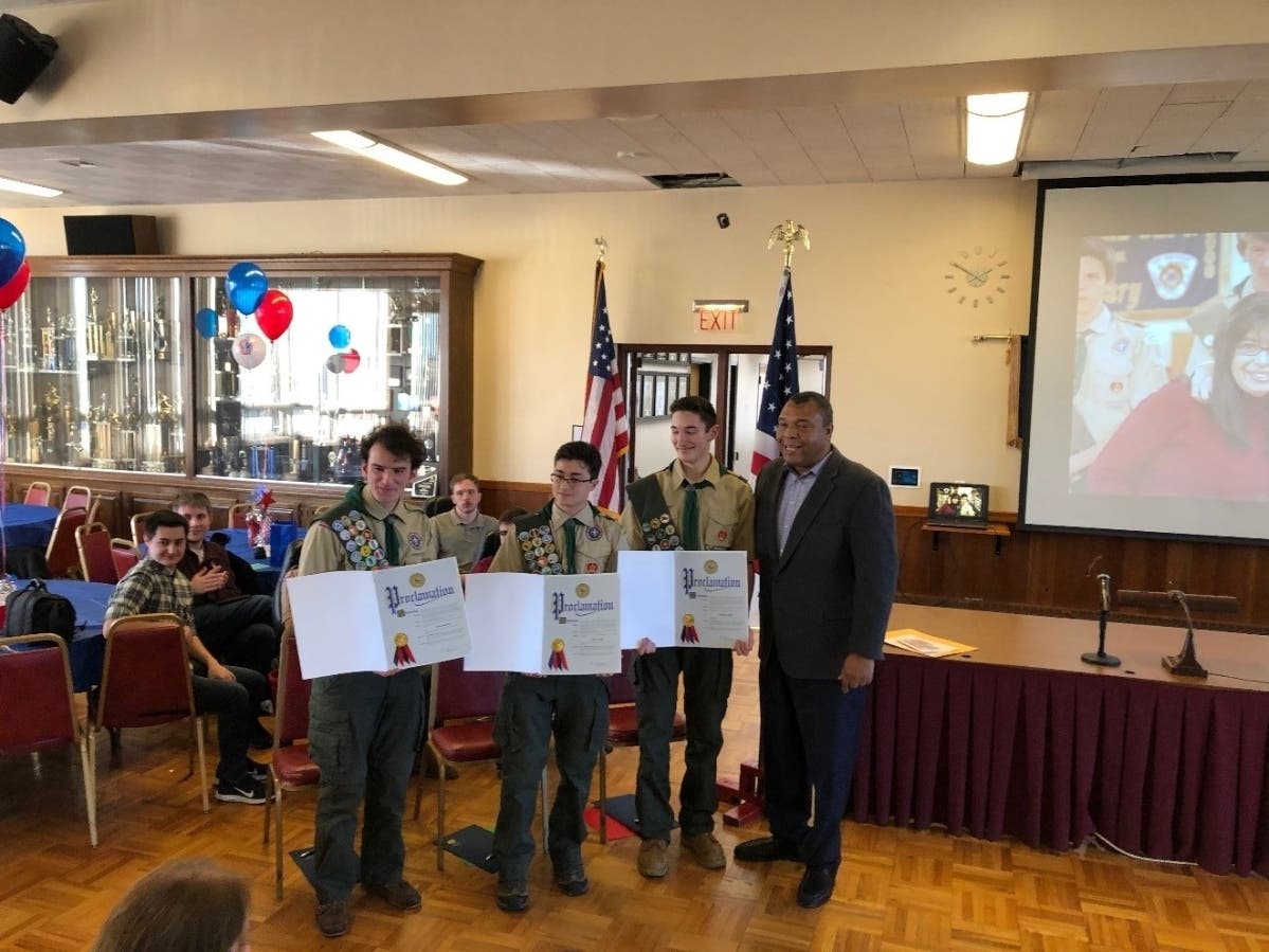 L-R: Eagle Scouts Aidan Sebesta, Lucas Cusati, and Nicholas Lembo of Northport Troop 41 with Suffolk County Legislator William Spencer.