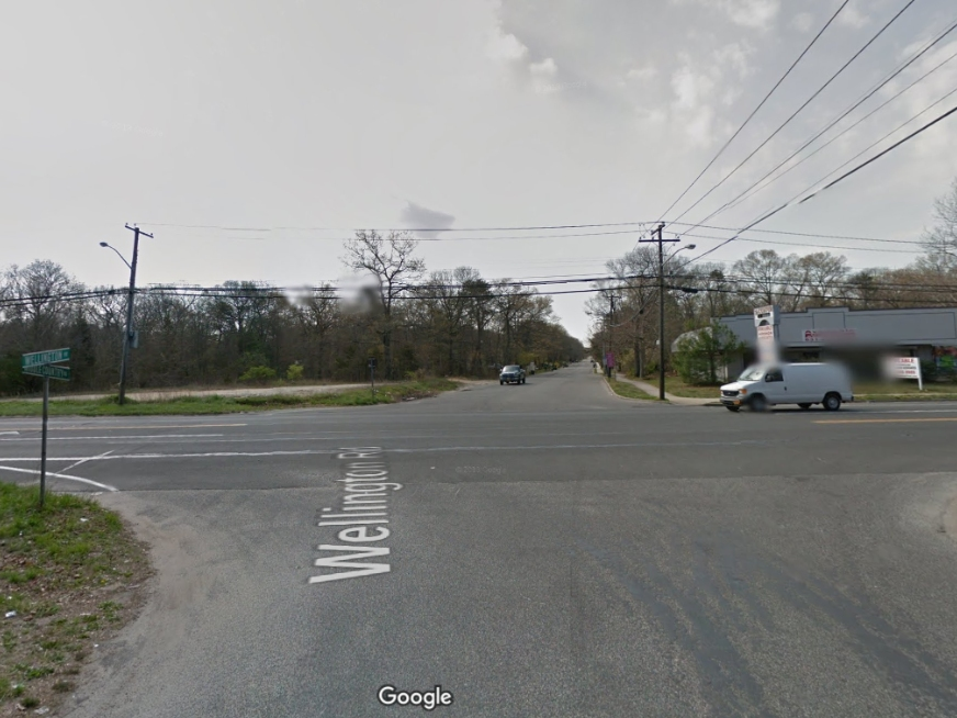 A man fired a handgun at a police officer Monday night in Middle Island after the man was involved in a car crash, police said.