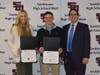 Smithtown High School West seniors Meghan Deery and William Alptekin were selected for the National School Development Council Award. They are pictured with Smithtown High School West Assistant Principal Christopher Elsesser (right).
