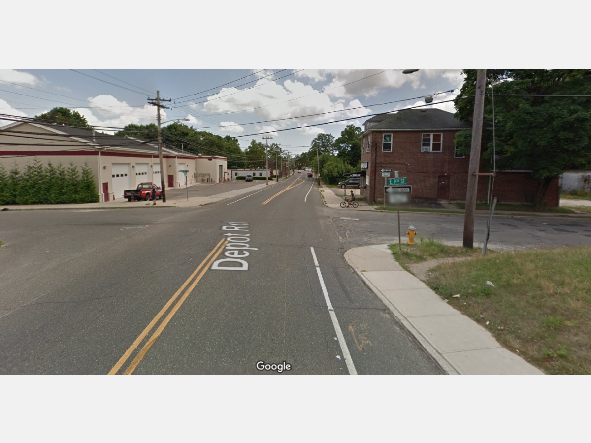 Two vehicles crashed in Huntington Station Tuesday night, causing a truck driver to become trapped. The Huntington Manor Fire Department came to his rescue.