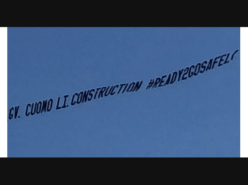 Long Island construction contractors organized a banner flyover across the sky to alert Gov. Andrew Cuomo they're ready to return to work safely.