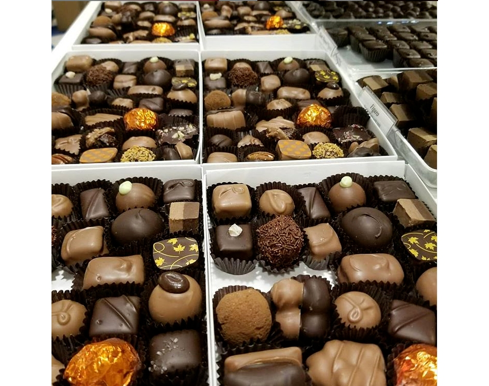 Bon Bons Chocolatier, a Huntington-based chocolate shop, has had to adjust its business model to adapt to challenges posed by the coronavirus outbreak.
