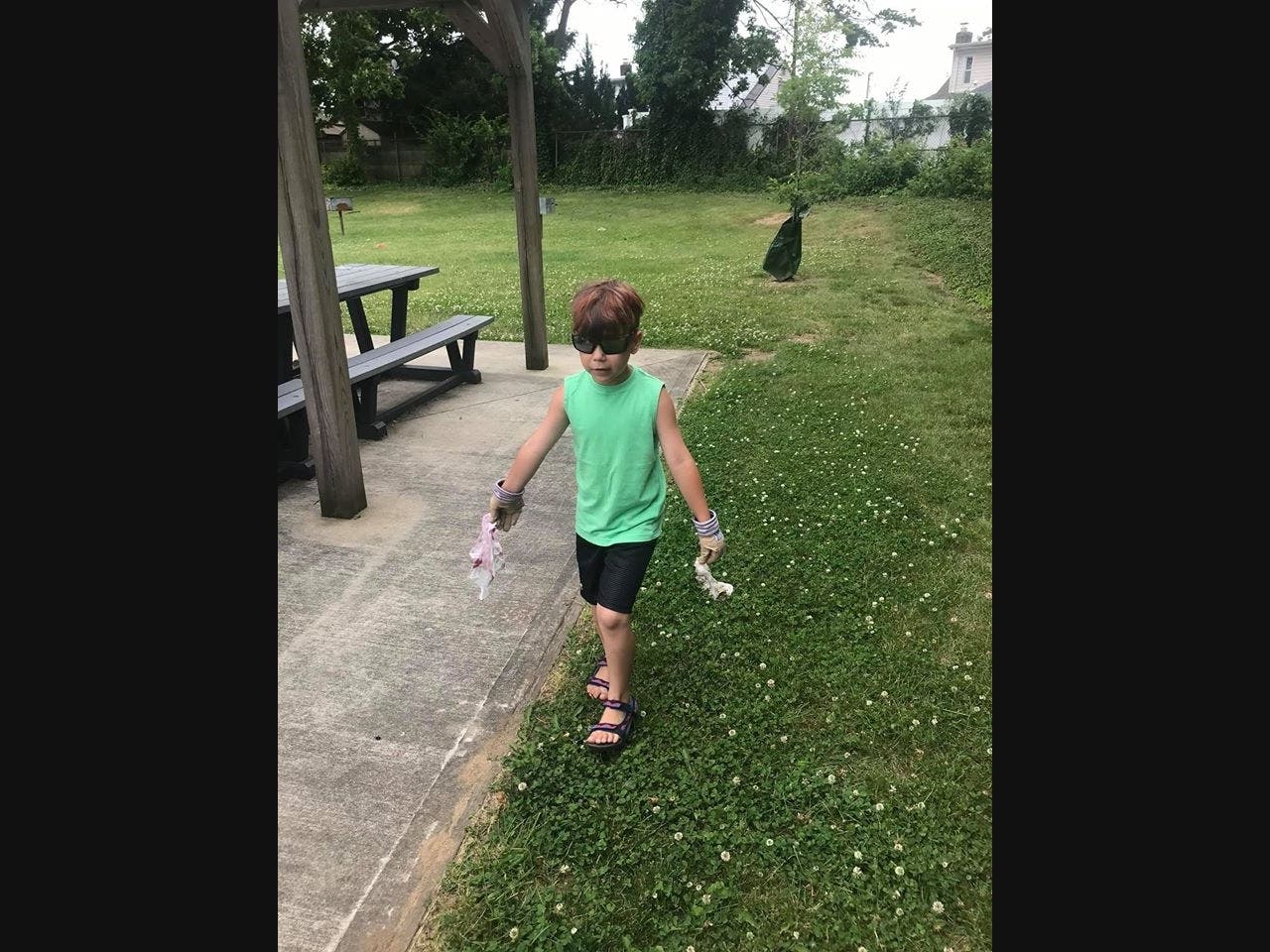AJ Retaleato, 6, has been cleaning parks and school grounds in Farmingdale, his father, Anthony, told Patch.