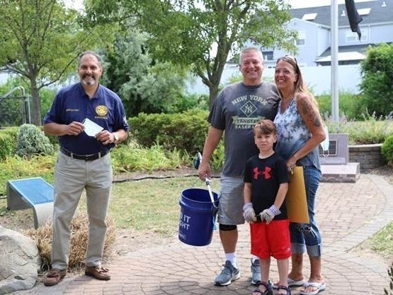 AJ Retaleato, 6, and his parents, Anthony & Michelle, recently met with Town of Oyster Bay Supervisor Joseph Saladino who thanked him for cleaning Kathy Mazza Memorial Park in Farmingdale.