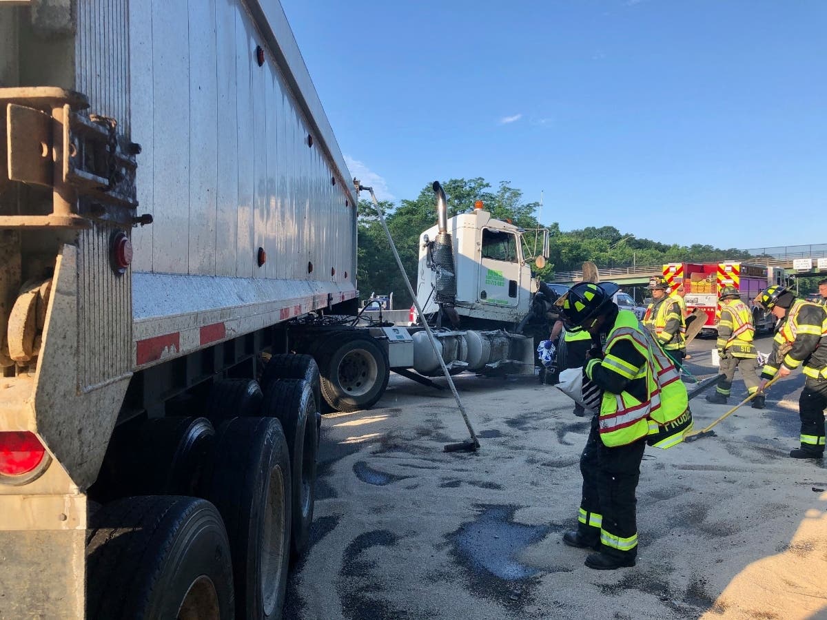 A tractor-trailer struck a guardrail on the Long Island Expressway in Dix Hills on Monday morning, causing diesel fuel to spill onto the road.