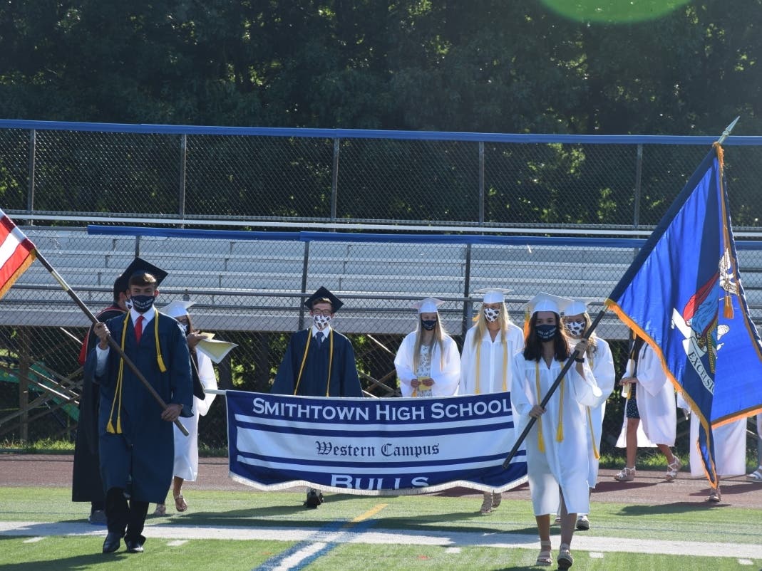 The Smithtown High School West Class of 2020 marched on to the football field to “Pomp and Circumstance” during their respective ceremonies on July 21 and 22.