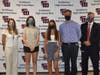 L-R: Annemarie Freund, Smithtown High School West guidance counselor, with National Merit Scholar semifinalists Fiona Needham and Christina Unkenholz, and Michael Agostino, Smithtown High School West guidance counselor, and Smithtown High School Wes