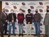 L-R: Smithtown High School West Principal John Coady, symphonic band faculty Tim Cassera, senior Liam Reynolds, senior Dominic Gibbons, choral faculty James Brosnan and Smithtown Central School District’s director of fine arts Michael Mastrangelo.
