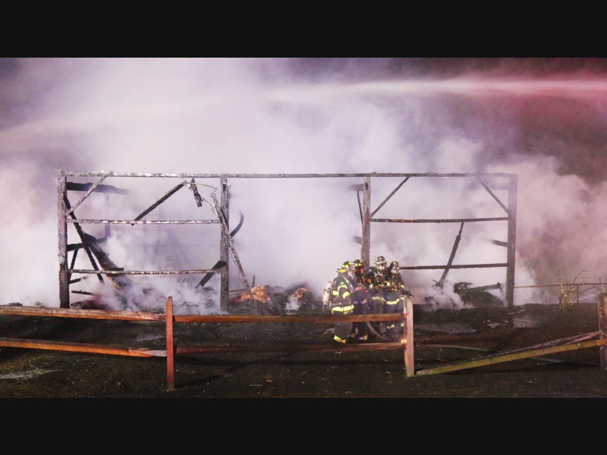 A fire tore through a barn in Cold Spring Harbor early Sunday.