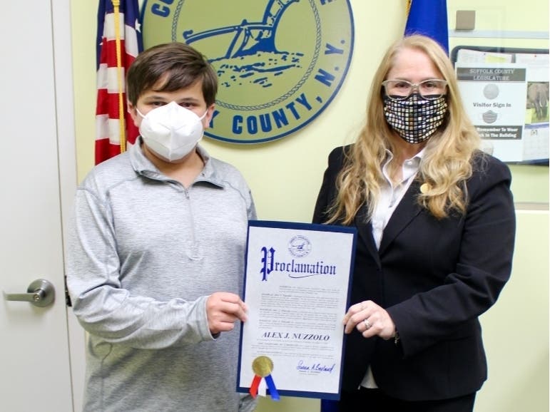 Alex J. Nuzzolo (left) with Suffolk County Legislator Susan A. Berland.