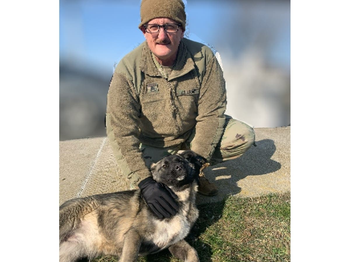 U.S. Army Sergeant Roberto with Teddy. Sgt. Roberto is aiming to bring Teddy home with him and teamed up with Nesconset nonprofit Paws of War.