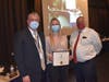 Northport physical education student of the month Hannah Morawski with Superintendent Robert Banzer and Board of Education President David Badanes.