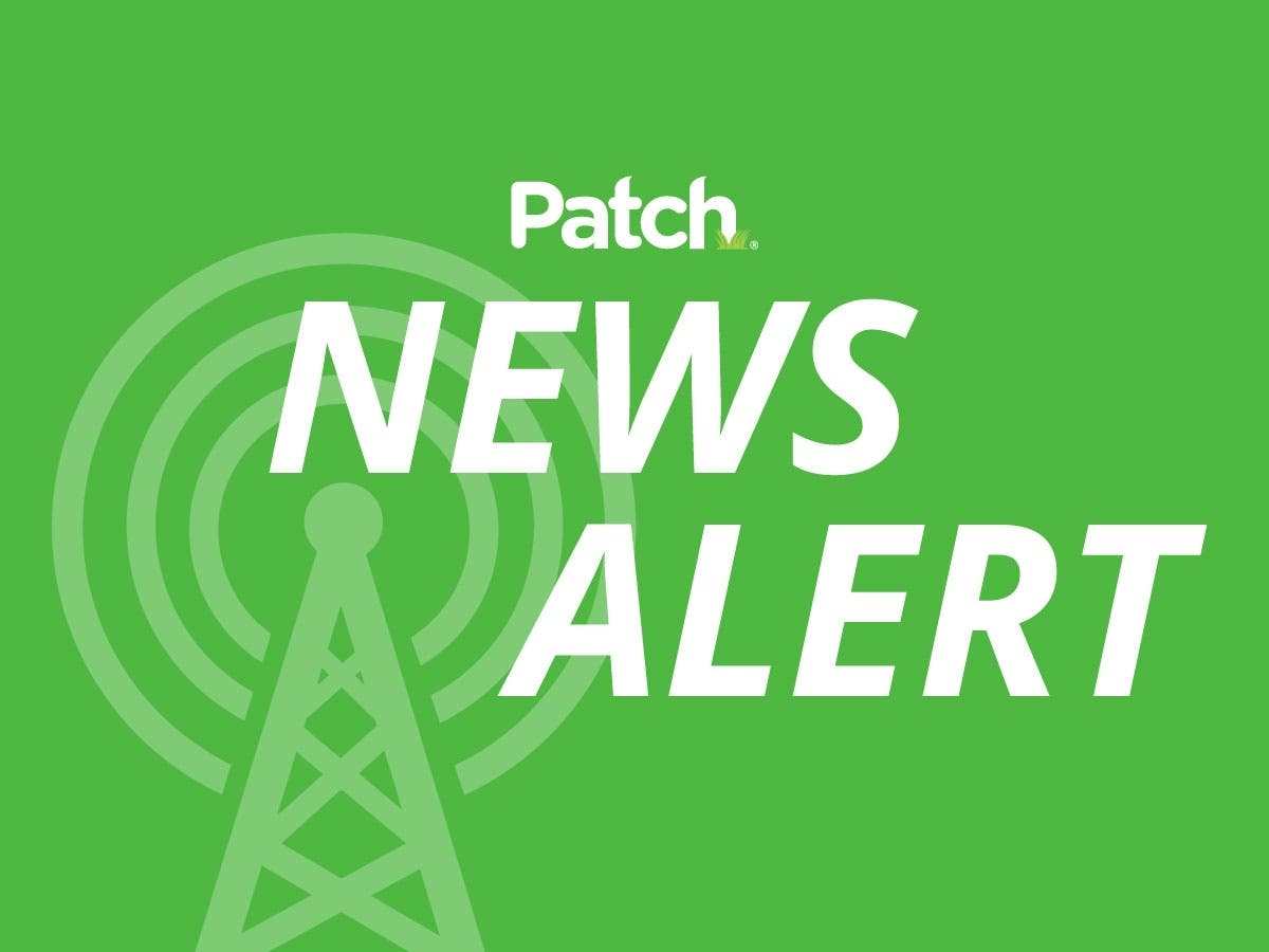 A woman's car was hit by a flying tire on the Long Island Expressway in Dix Hills on Wednesday afternoon, Suffolk police said.