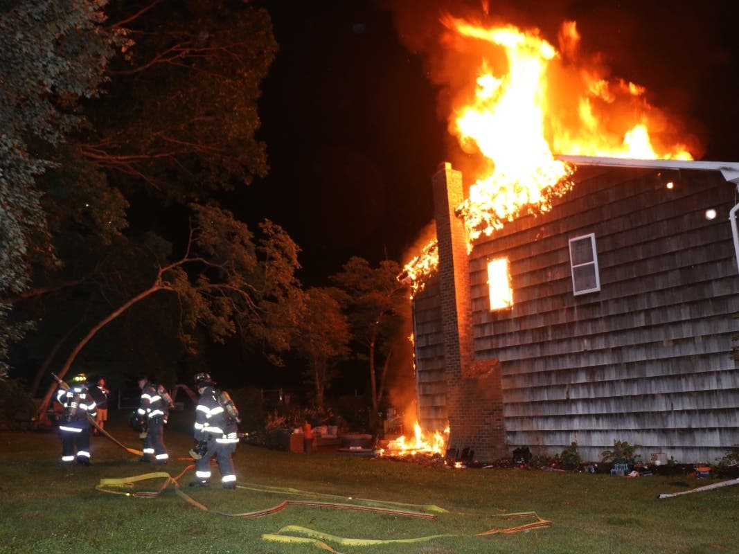 A Dix Hills home was gutted by a fire early Tuesday morning.