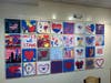 The “Community of Hearts” art exhibit honors the lives lost on Sept. 11, 2001, as hearts were drawn to be displayed at the libraries in Northport and East Northport.