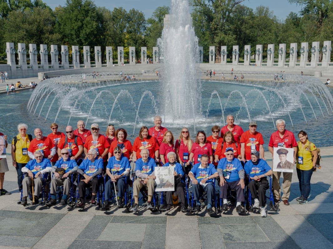 Nine World War II Veterans, their guardians and Honor Flight Long Island officials at the Washington, D.C. World War II memorial on Oct. 3, 2021.