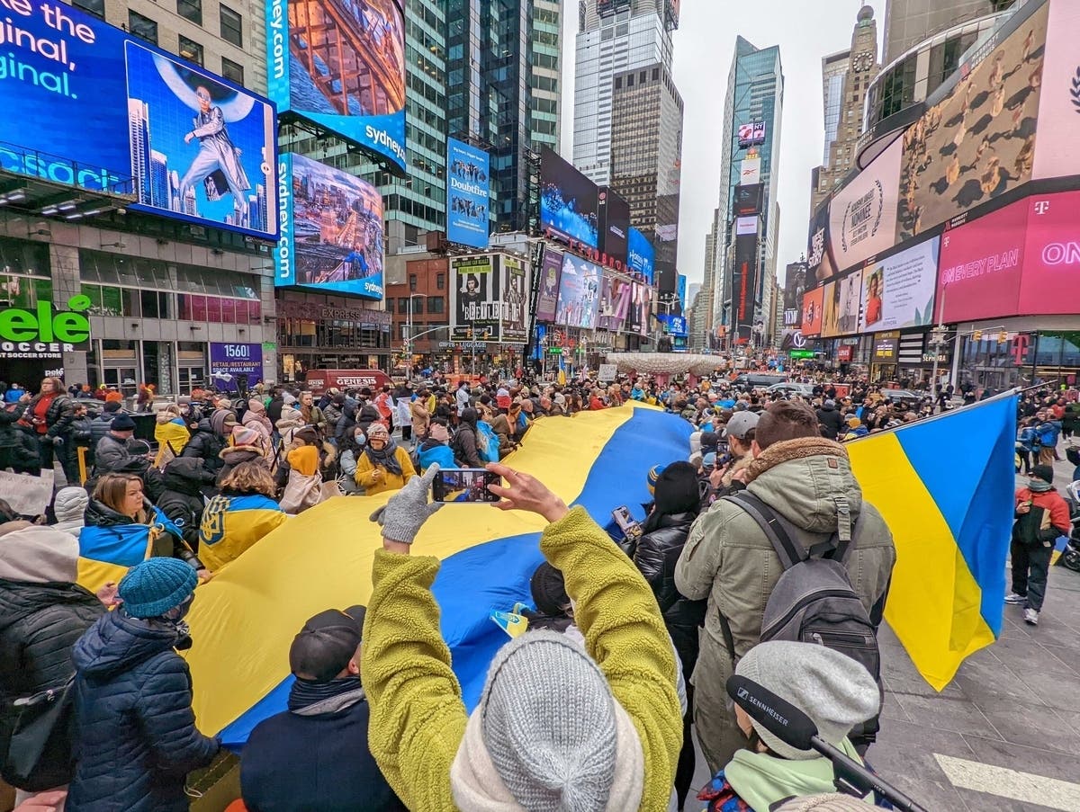 Protestors gather in New York City on Feb. 24 to show support for Ukraine after the country was invaded by Russia. Farmingdale State Farm Agent Joseph Benincasa is collecting donations for Ukraine at his office.