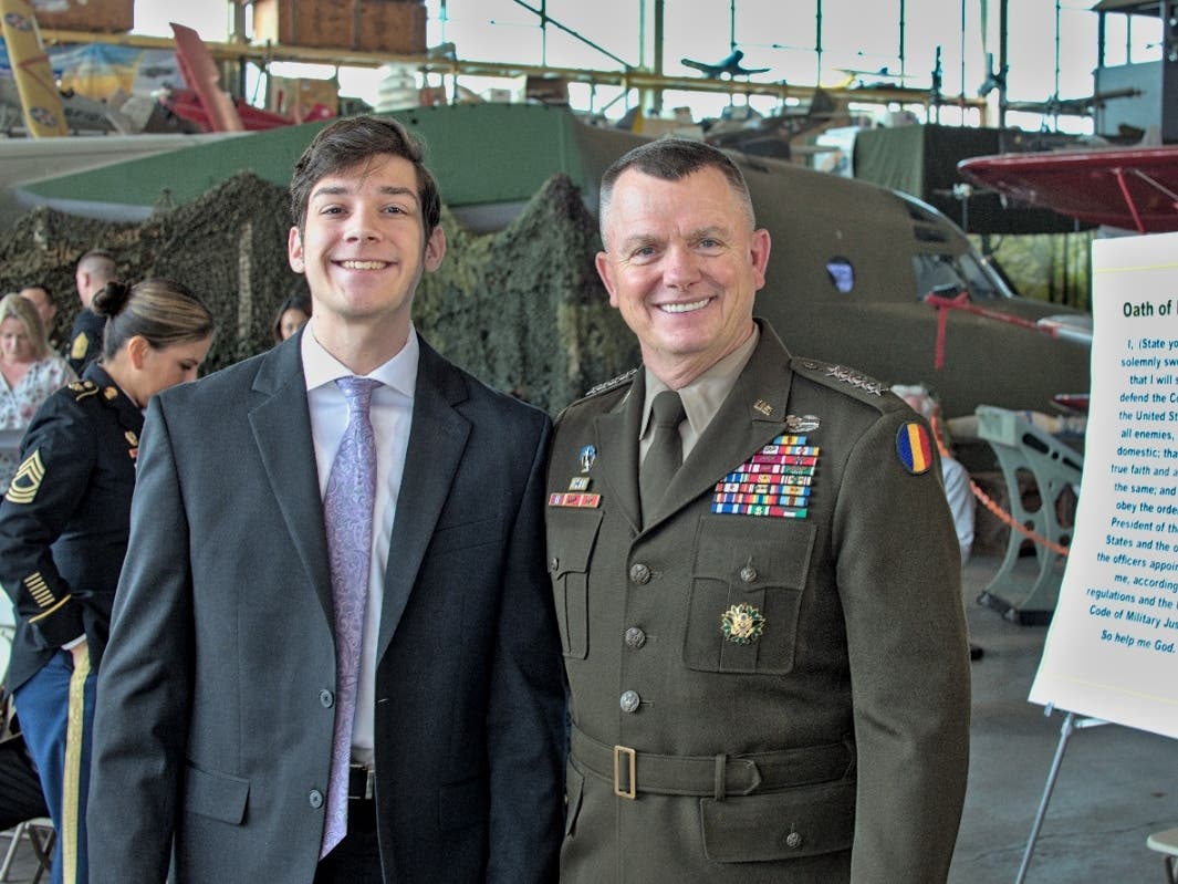 Scholarship Recipient Aidan Carman (L) and U.S. Army General Paul E. Funk II at the American Airpower Museum in Farmingdale.