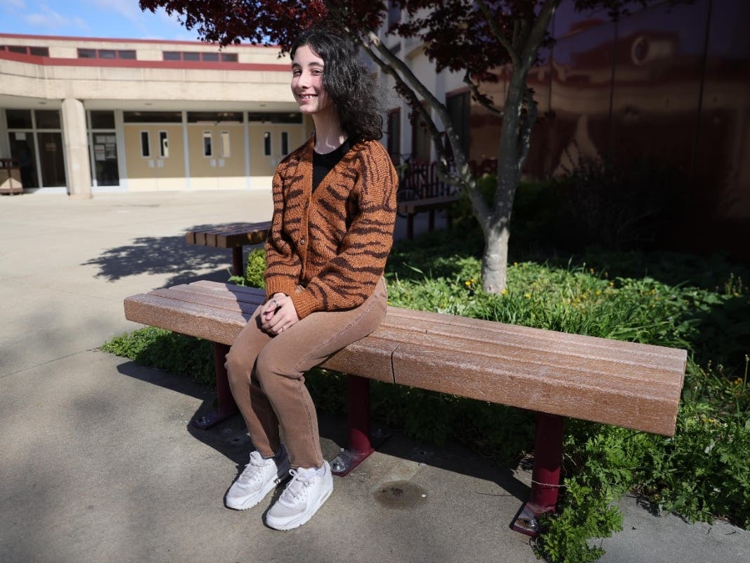 Alicia DiGiambattista outside Great Hollow Middle School. She won the Walt Whitman Poetry Contest.