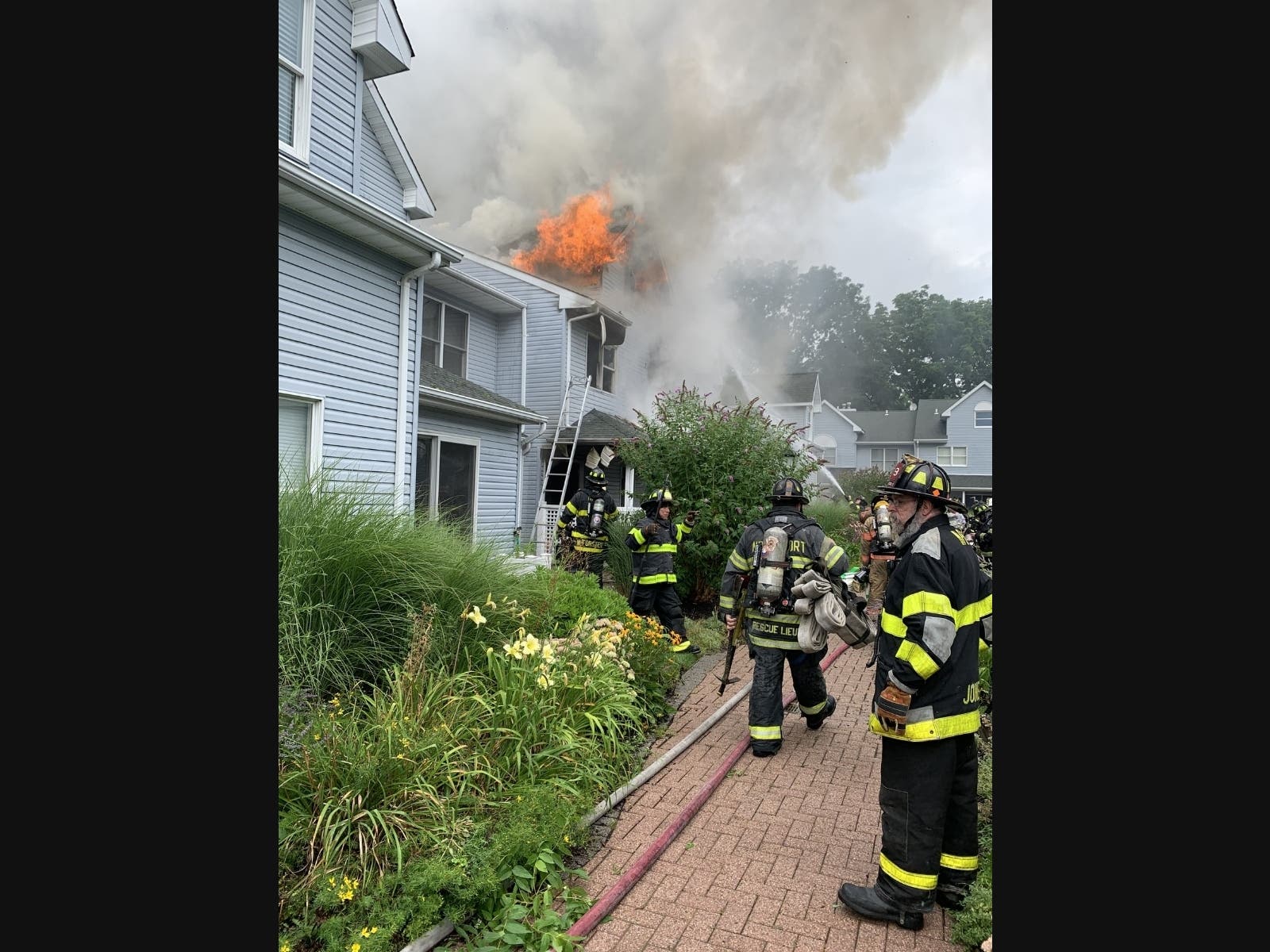 Firefighters battled a Centerport condo blaze on Monday afternoon.