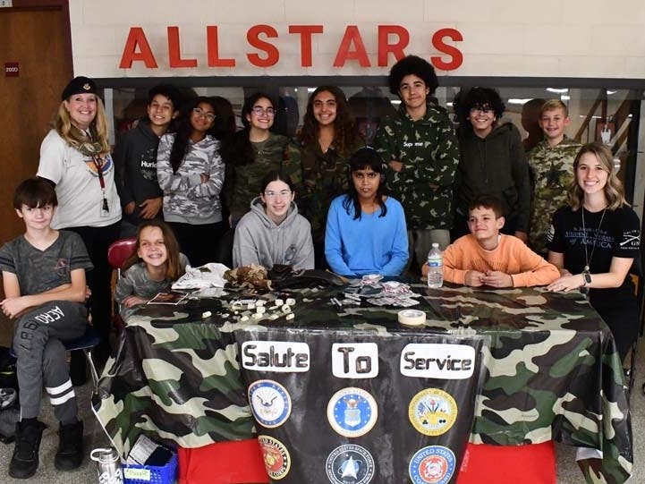Students make a salute to service at Nesaquake Middle School by raising funds for supplies for veterans at the Northport VA.